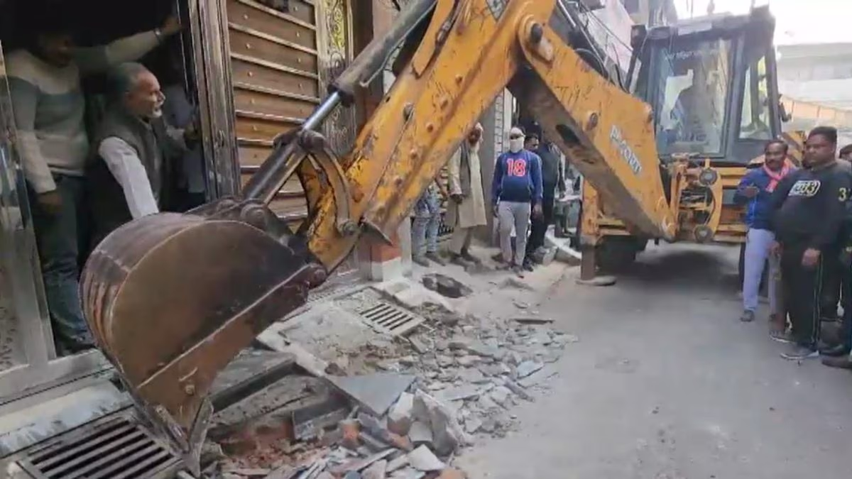 Power line topples onto bulldozer during operation in Sambhal, near the MP and MLA's zones