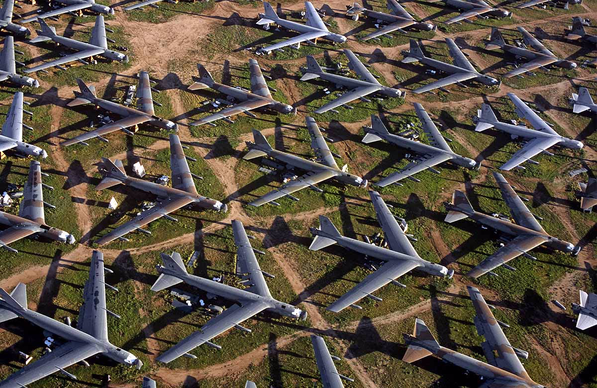 A sprawling aircraft graveyard showcasing thousands of planes and spacecraft