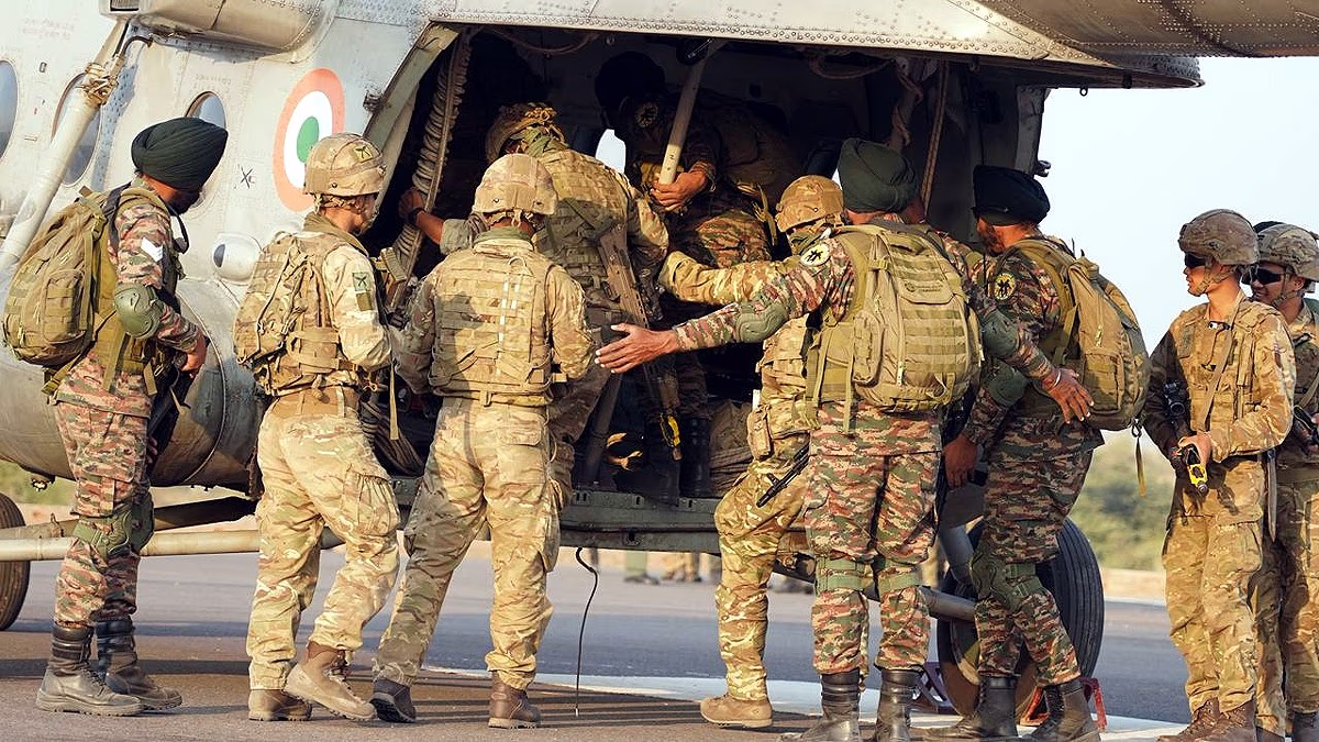 British Gurkha and Indian Sikh Battalion soldiers traveling by Air Force helicopter for exercises at Mahajan Range. (Photos: X/ADGPI)