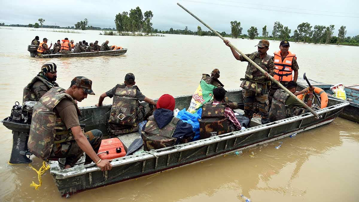 Soldiers evacuating people from flood-affected areas in Punjab to safer locations.
