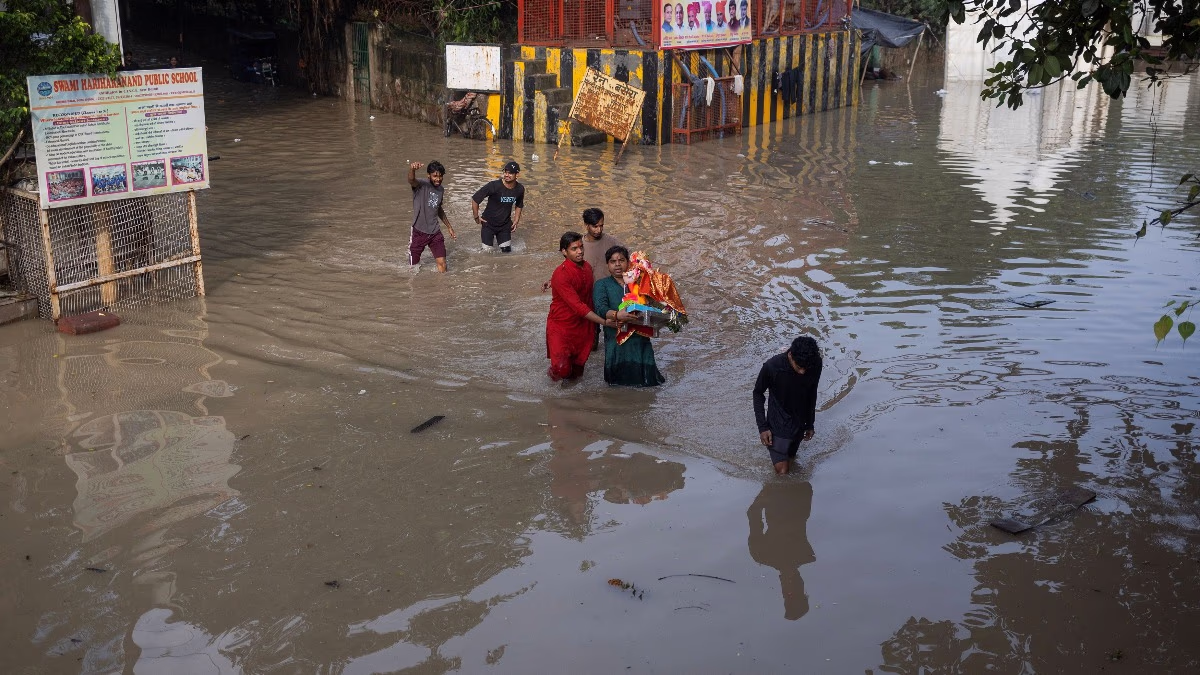 Delhi's cityscape and Yamuna's close proximity resulting in inundated areas. Satellite images showcase these regions immersed in Yamuna's bed.