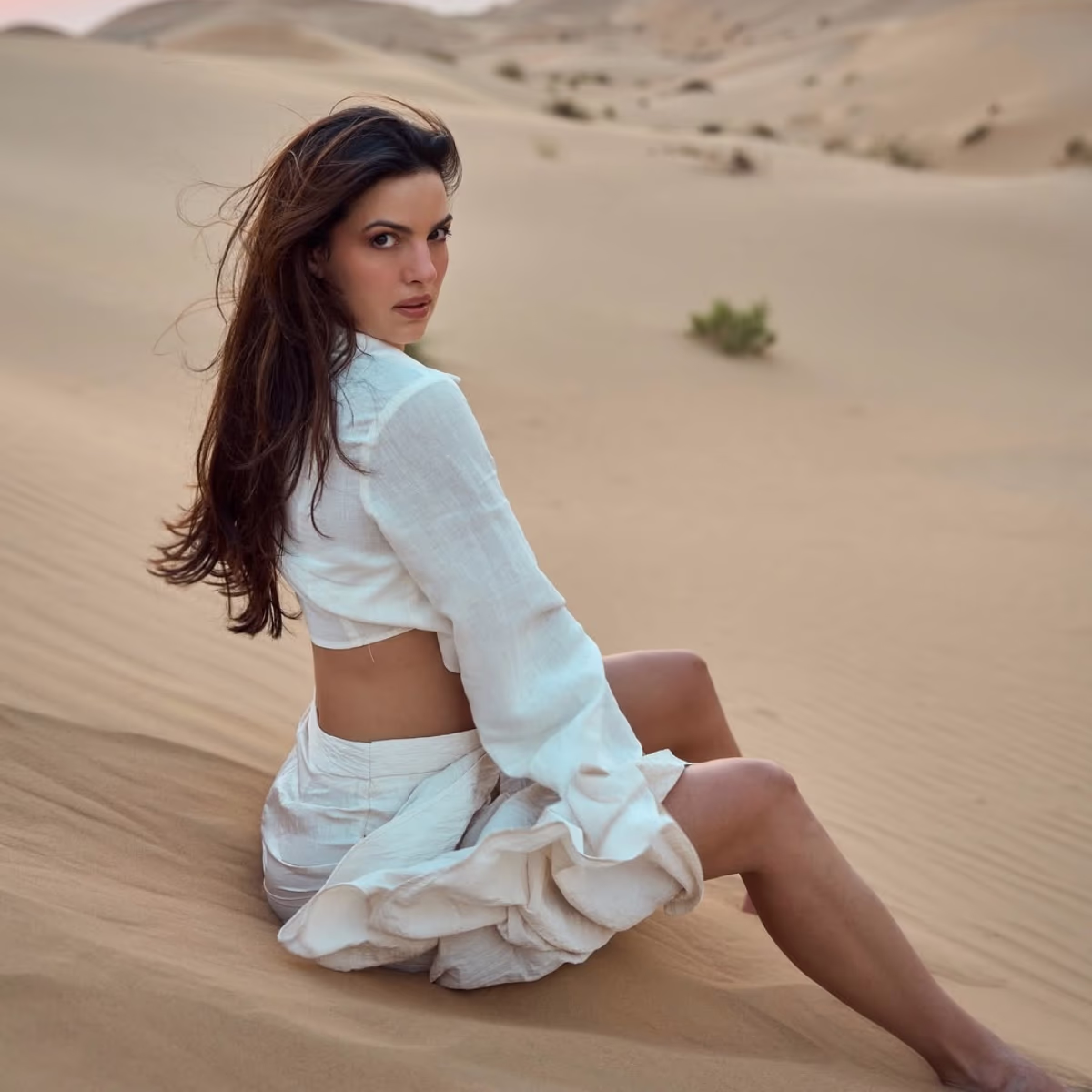 Natasa posing on sand in style